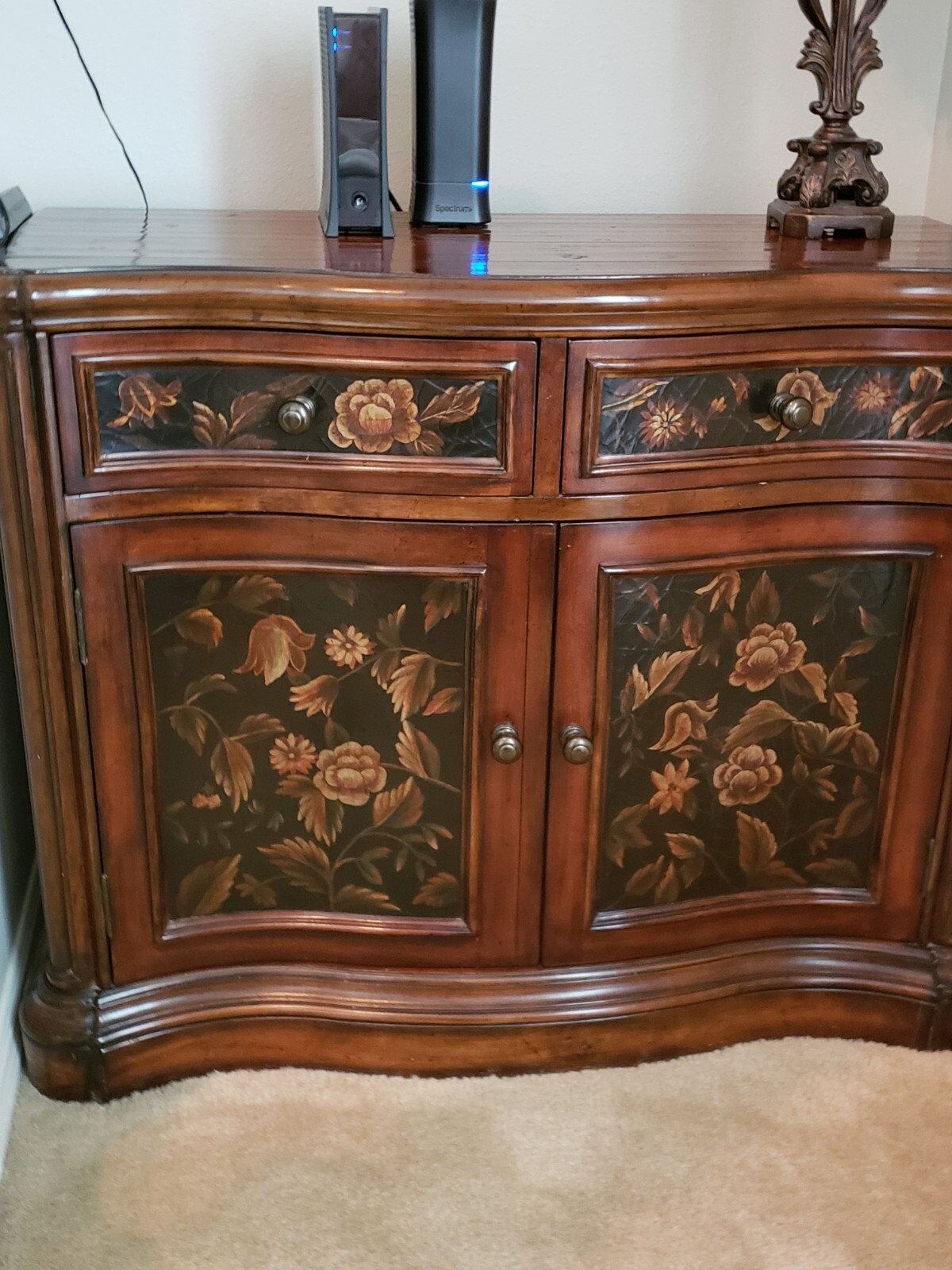 Beautiful 2 drawer 2 door high quality wood cabinet with flower pattern panels.