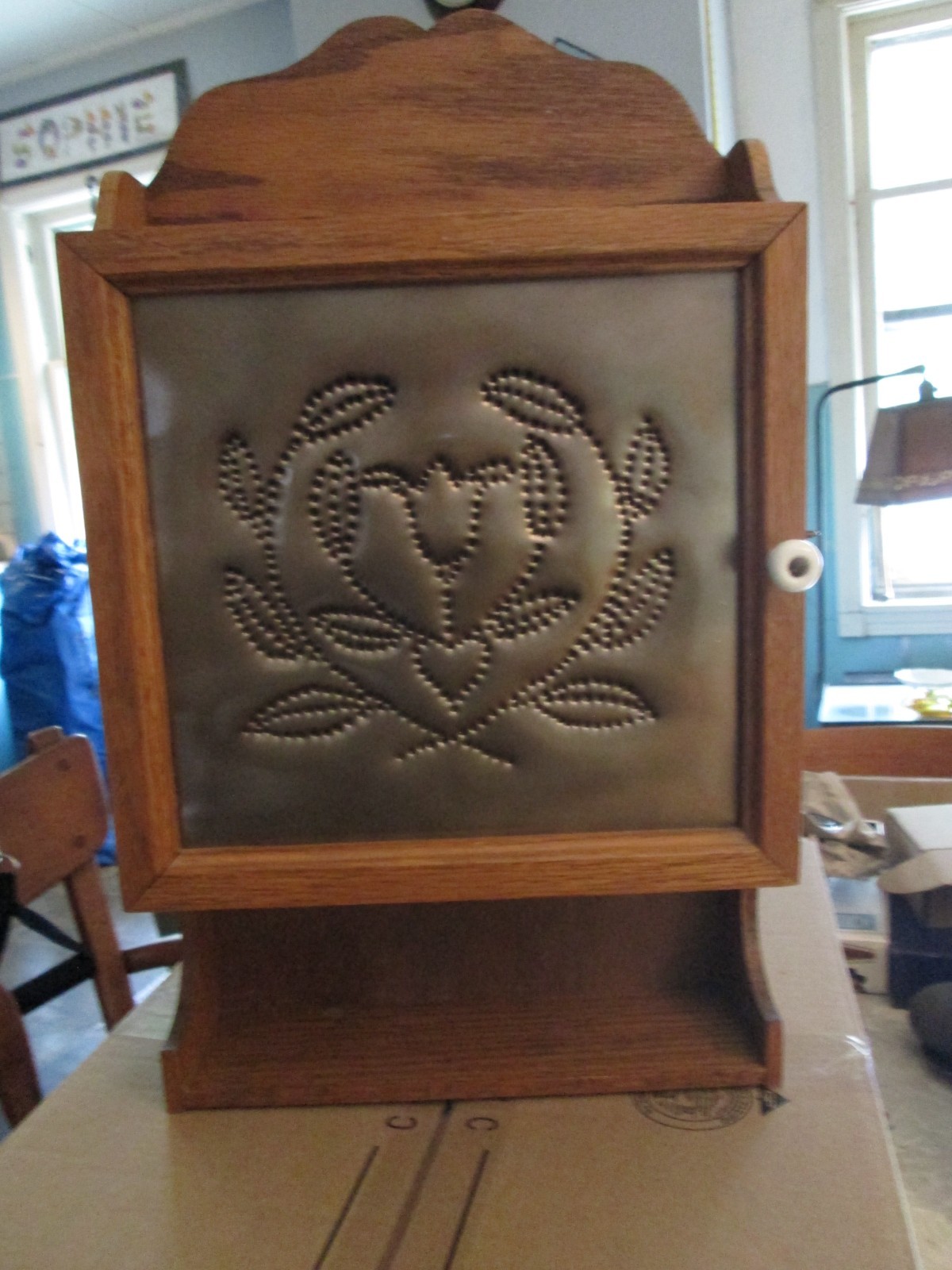 three shelf oak vintage small cabinet, copper stamped flower porcelain handle